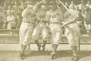(L-R Billy Herman, Pee Wee Reese, Dolph Camilli, Arky Vaughan). The 1942 Dodger infield forms a baseball diamond with four baseball bats.