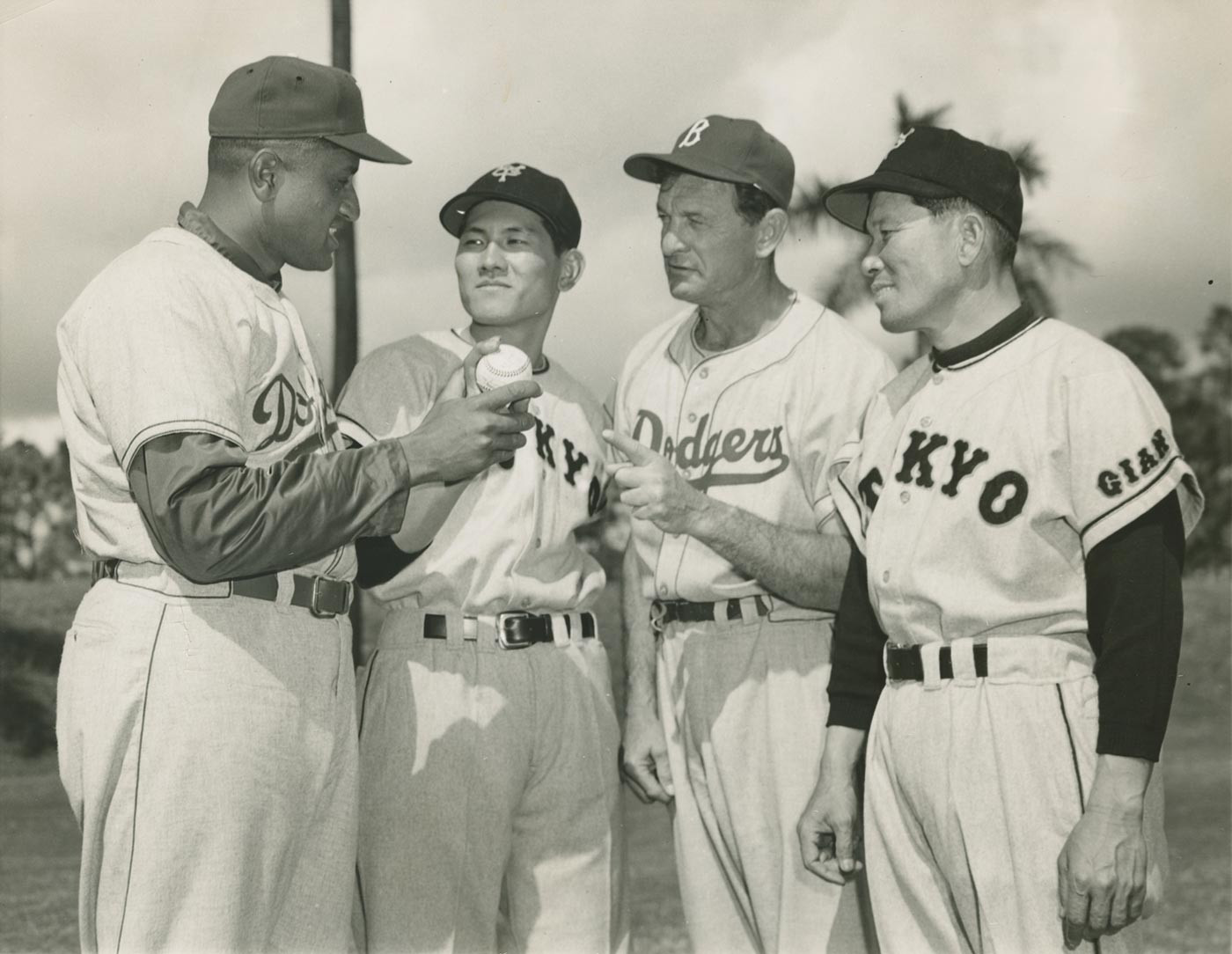 (L-R) Don Newcombe; pitcher Sho Horiuchi; Dodger pitching coach Joe Becker; catcher Shigeru Fujio.